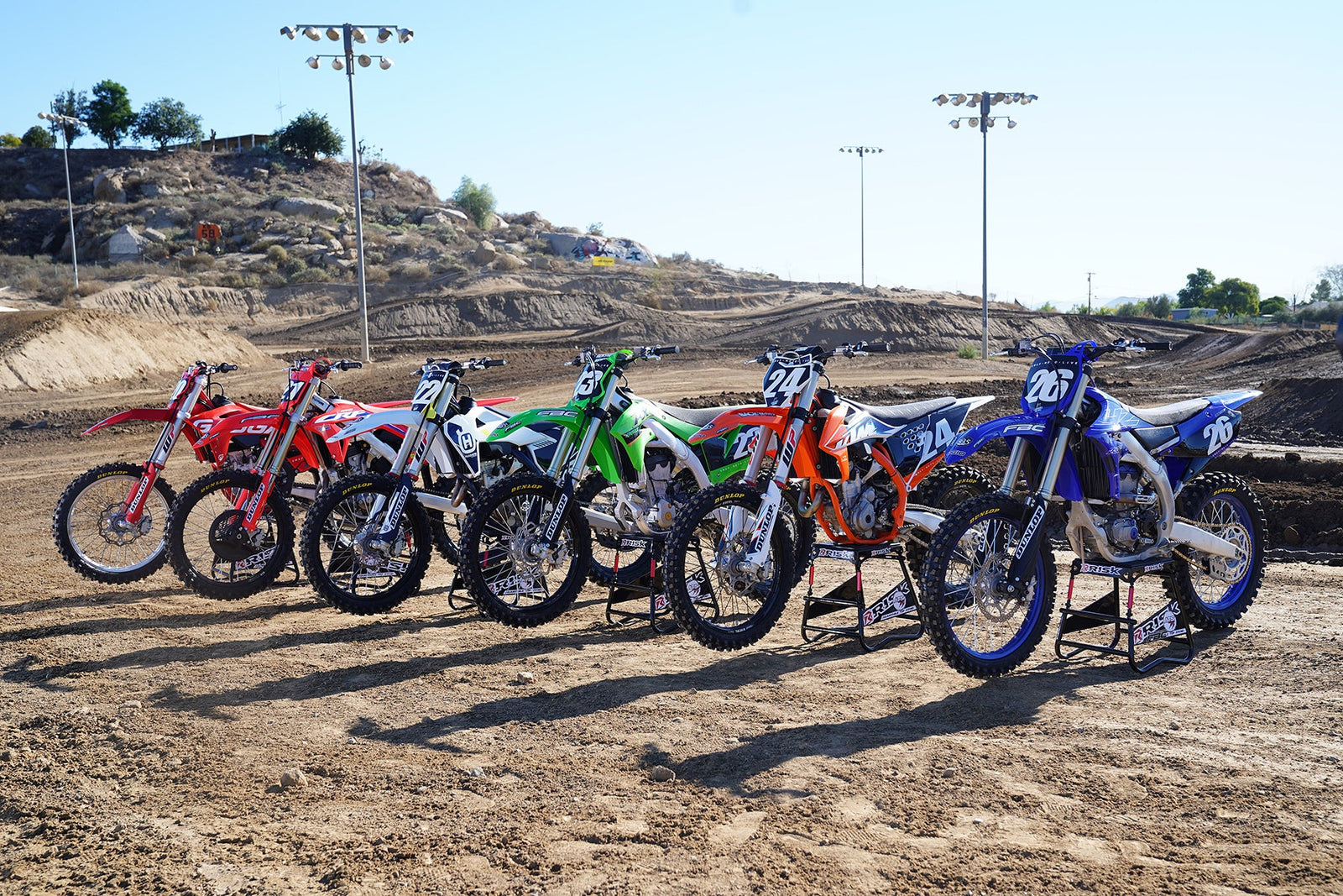 Image from the 2022 swap moto live shoot out where they test each bike to see which one is the best all around bike. The used risk racing a.t.s. stands to rest all the makes they were testing on.