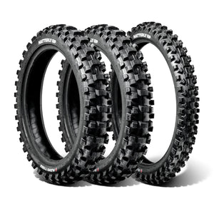 Three off-road dirt bike tires with knobby treads on a white background