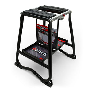 Course à risque F.F.S. Factory Fold Stand, support de motocross en acier noir sur fond blanc